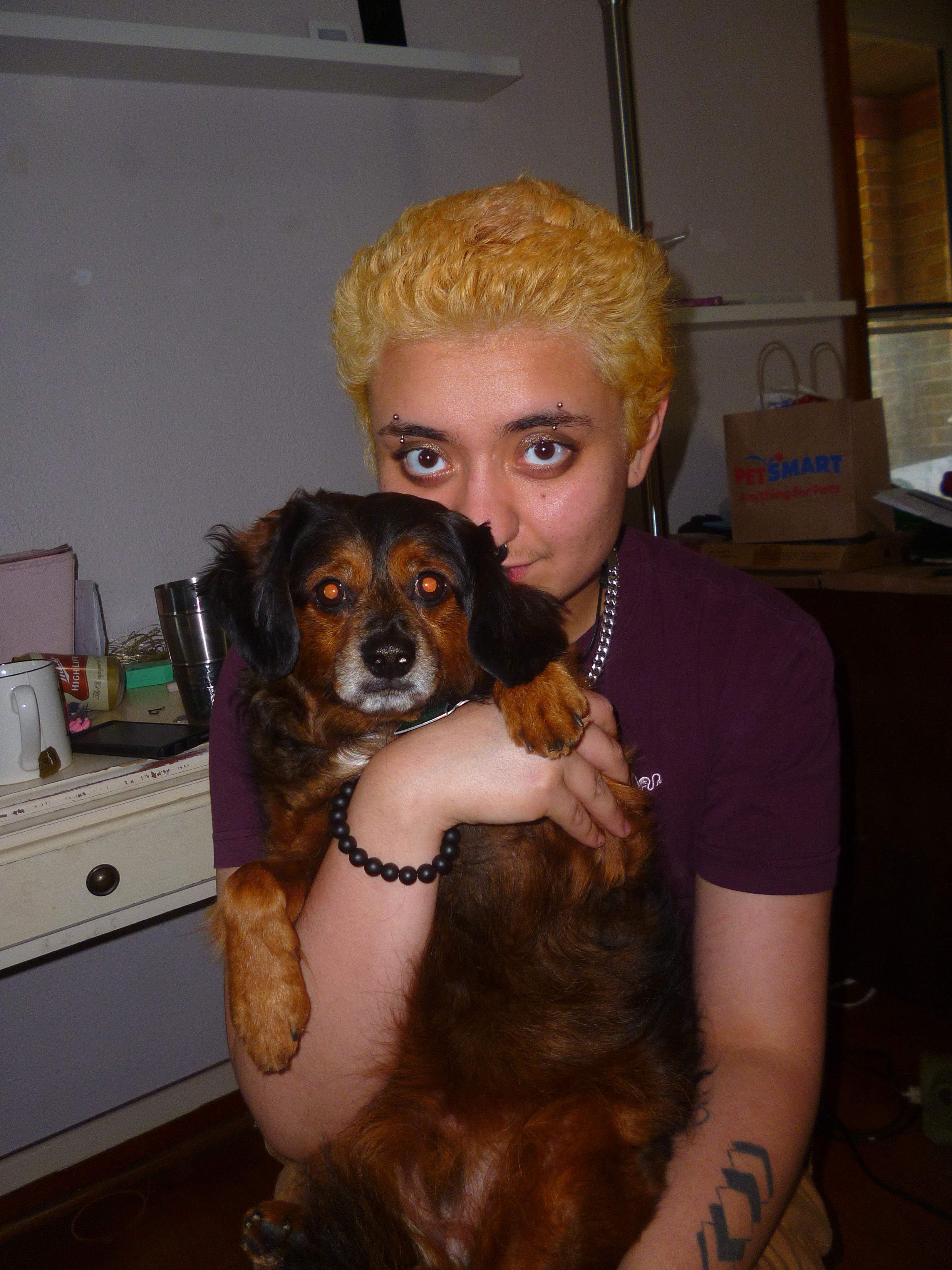 David holding Bobby (our dog)