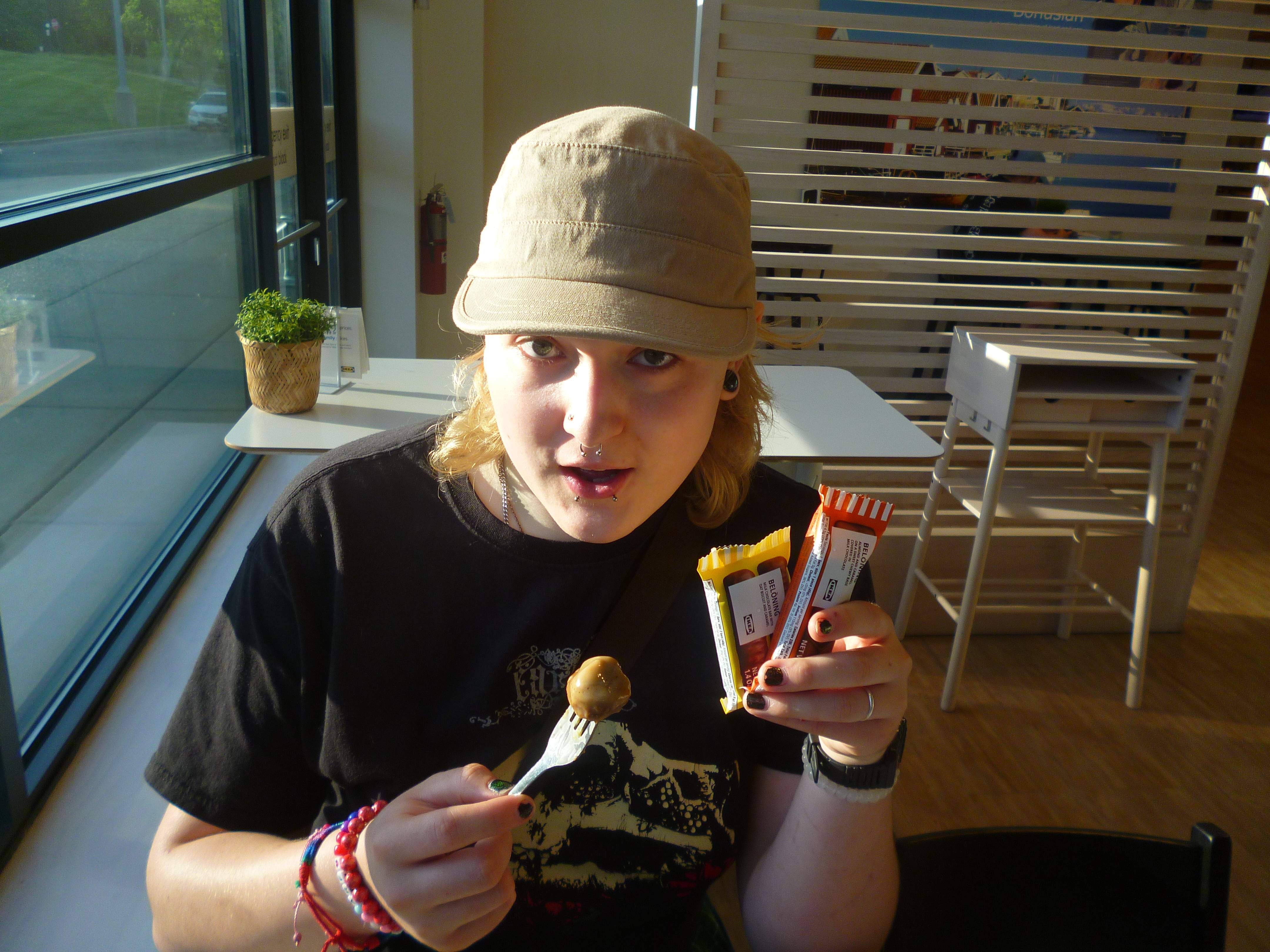 Katie with Ikea candy and swedish meatball at Ikea.