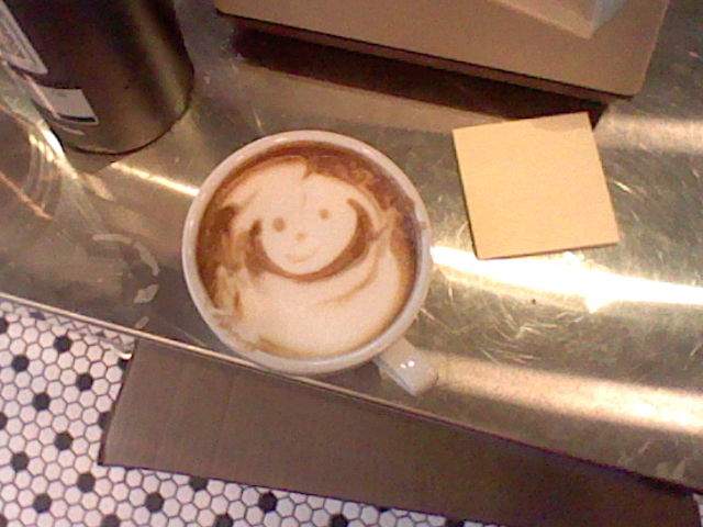 poorly done latte art by yours truly.